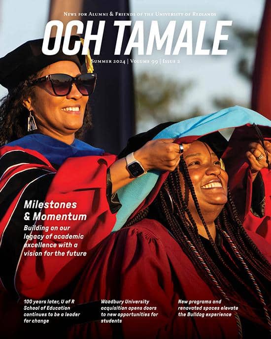 a magazine cover with a person in a graduation gown and sunglasses