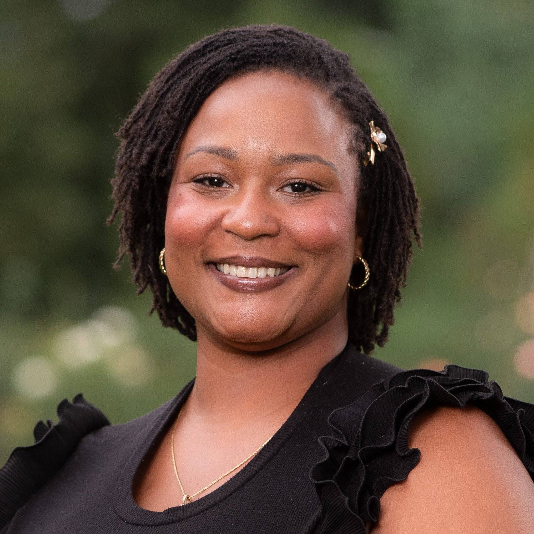 a person smiling at camera