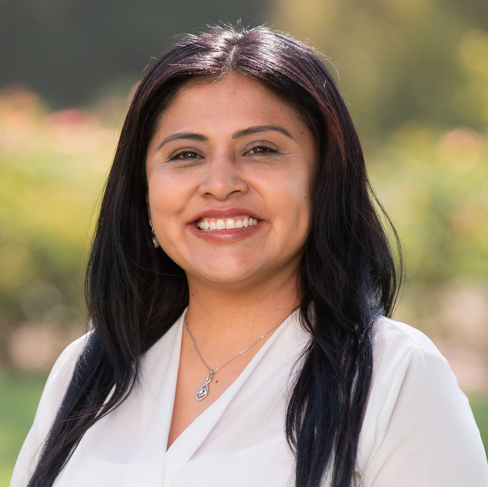 a person smiling at camera