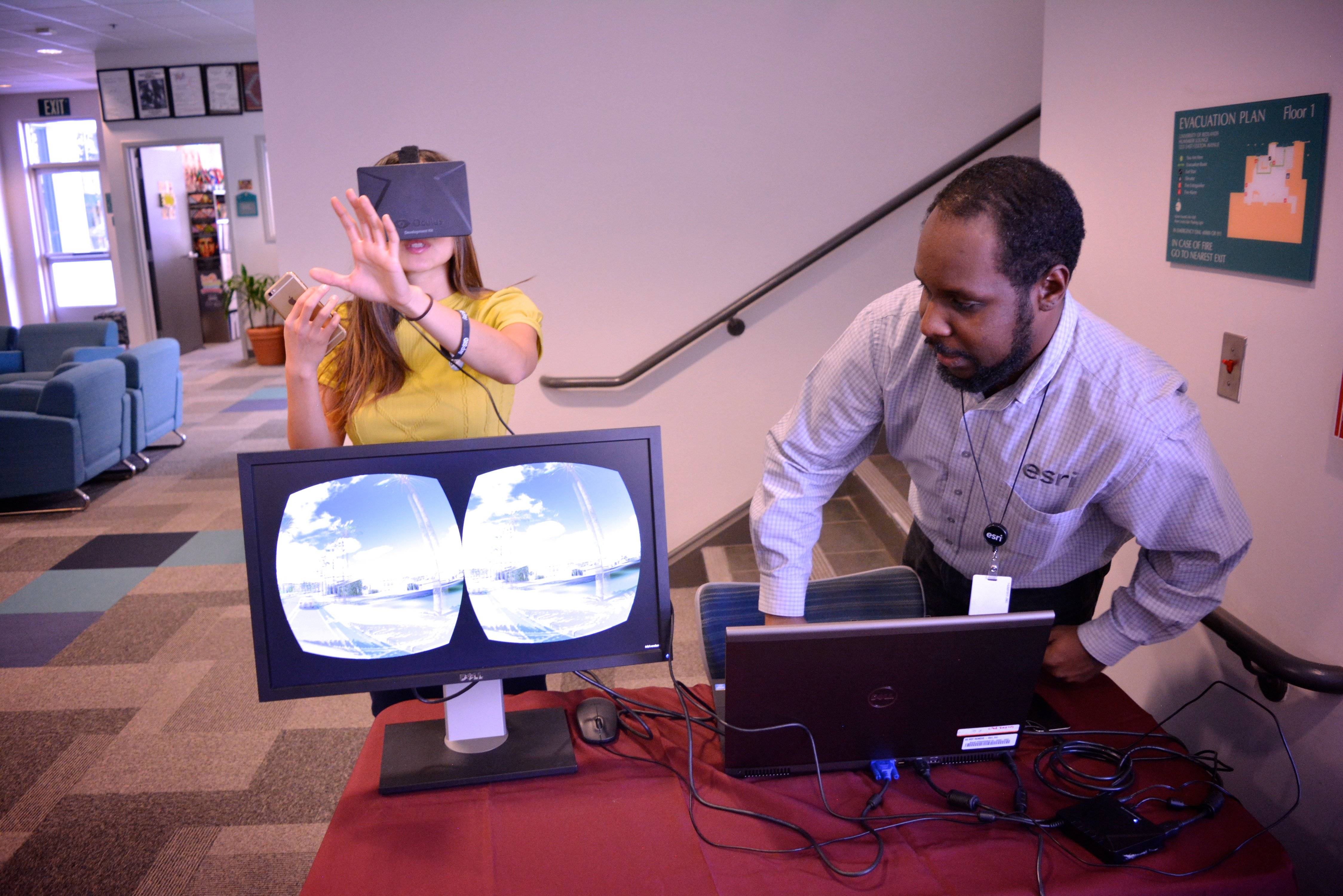 a person and person using a virtual reality device