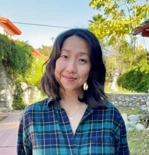 a person smiling at the camera