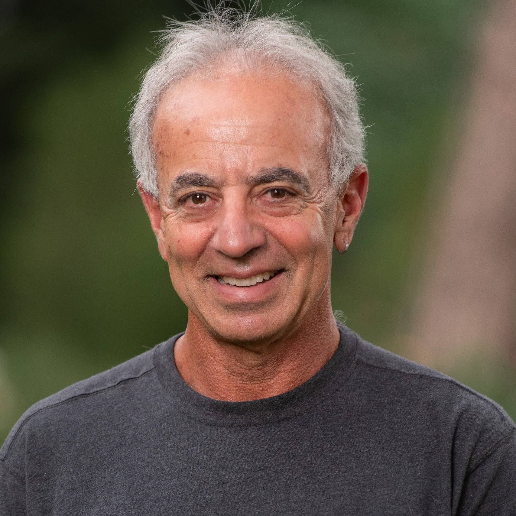 a person smiling for a picture