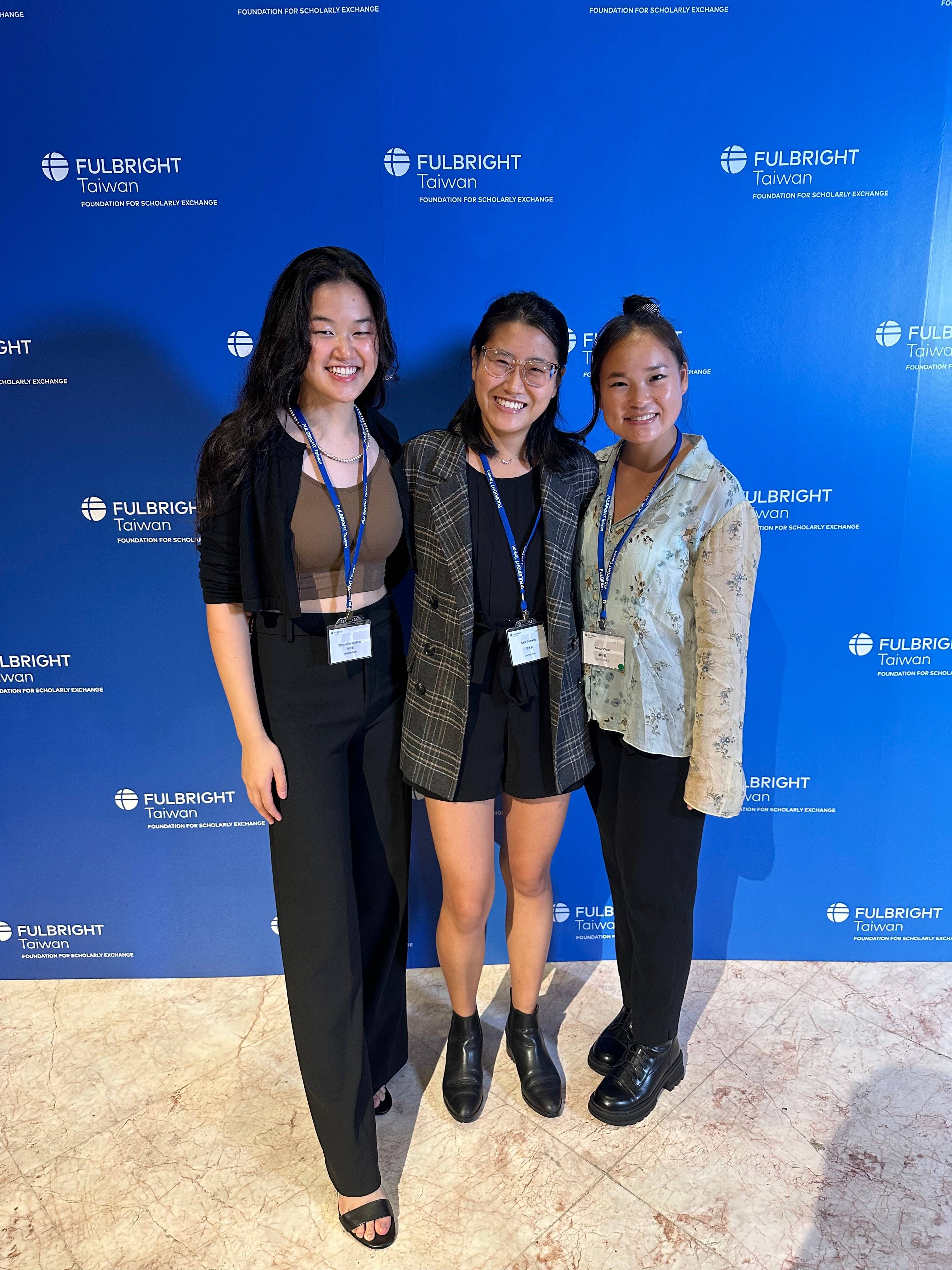 a group of women posing for a photo