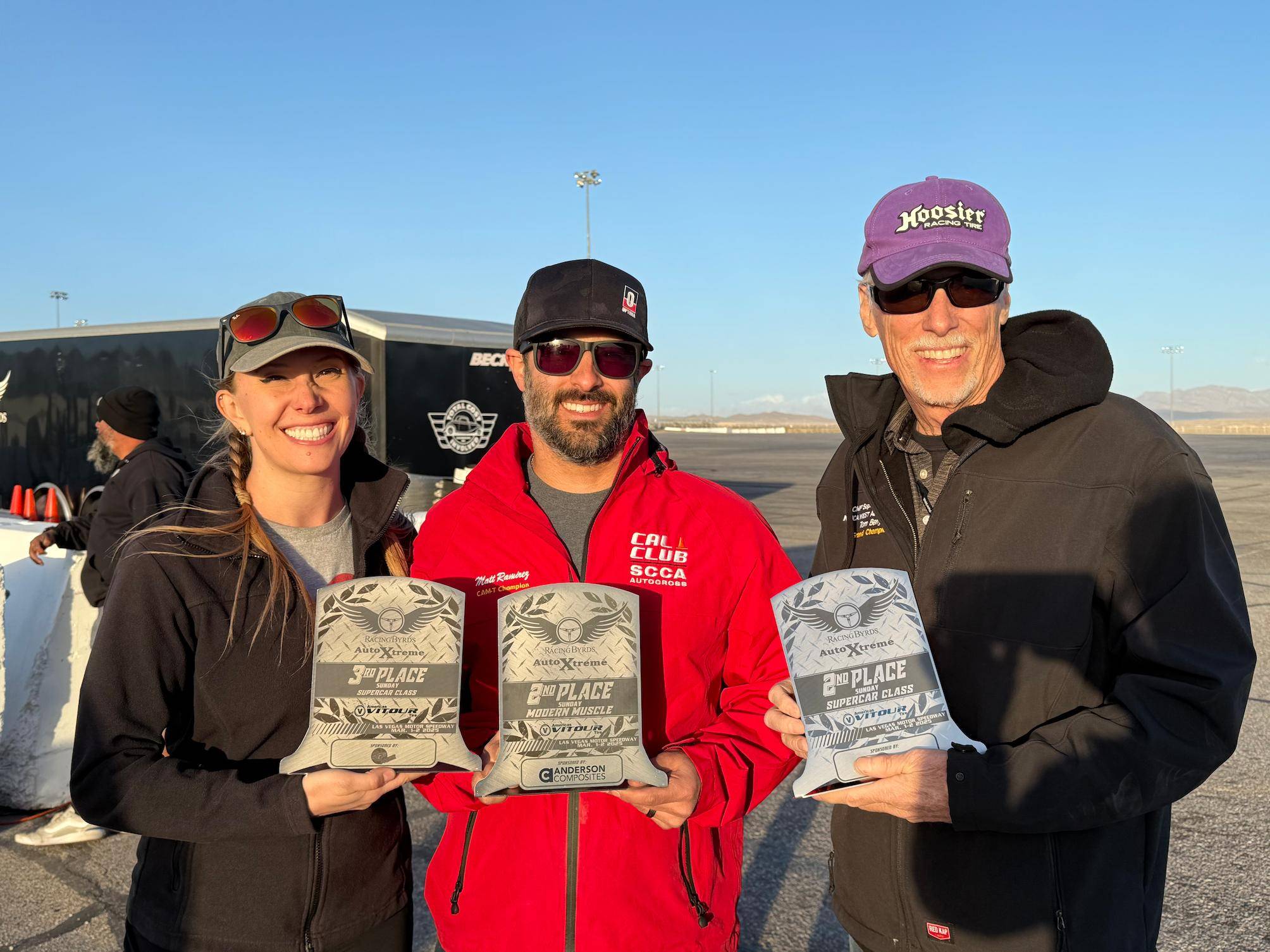 a group of people holding bags