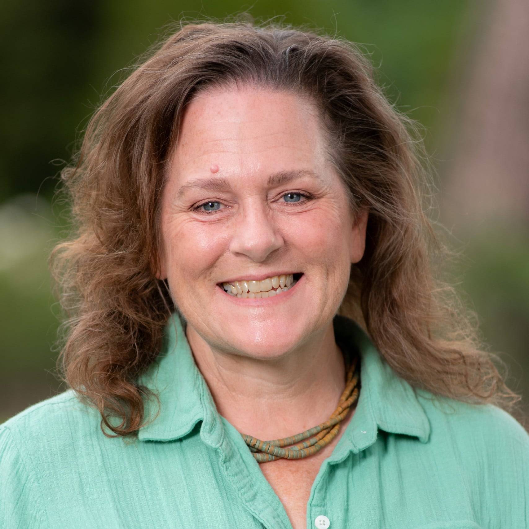 a person smiling at camera