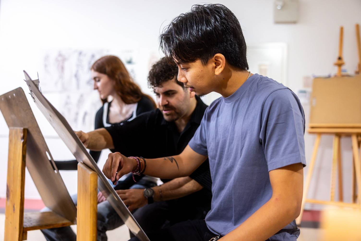 a group of people sitting in a room