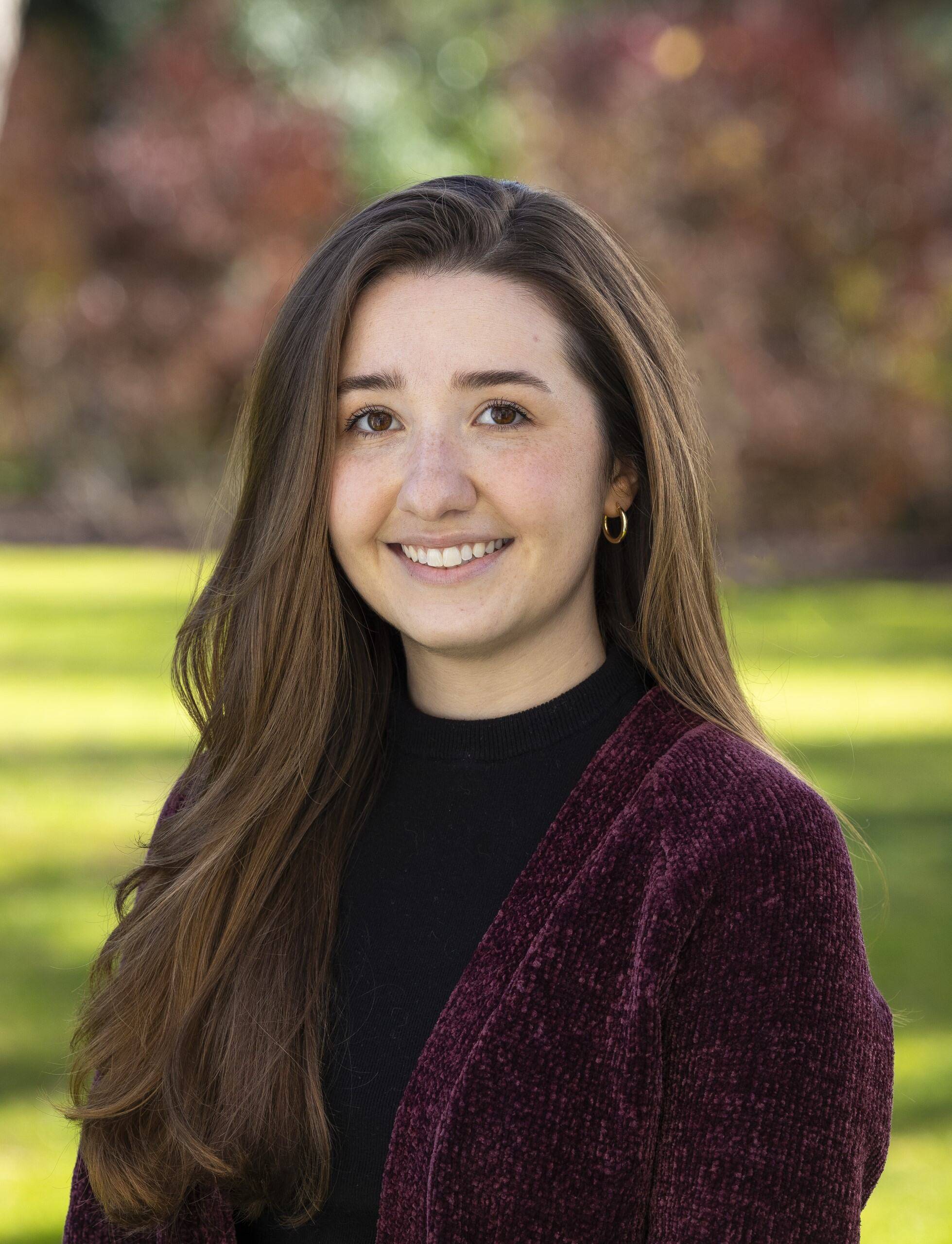 a person smiling at camera