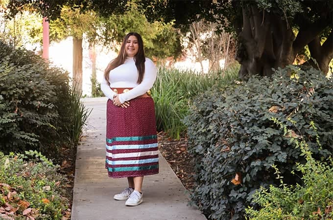 a person standing on a sidewalk