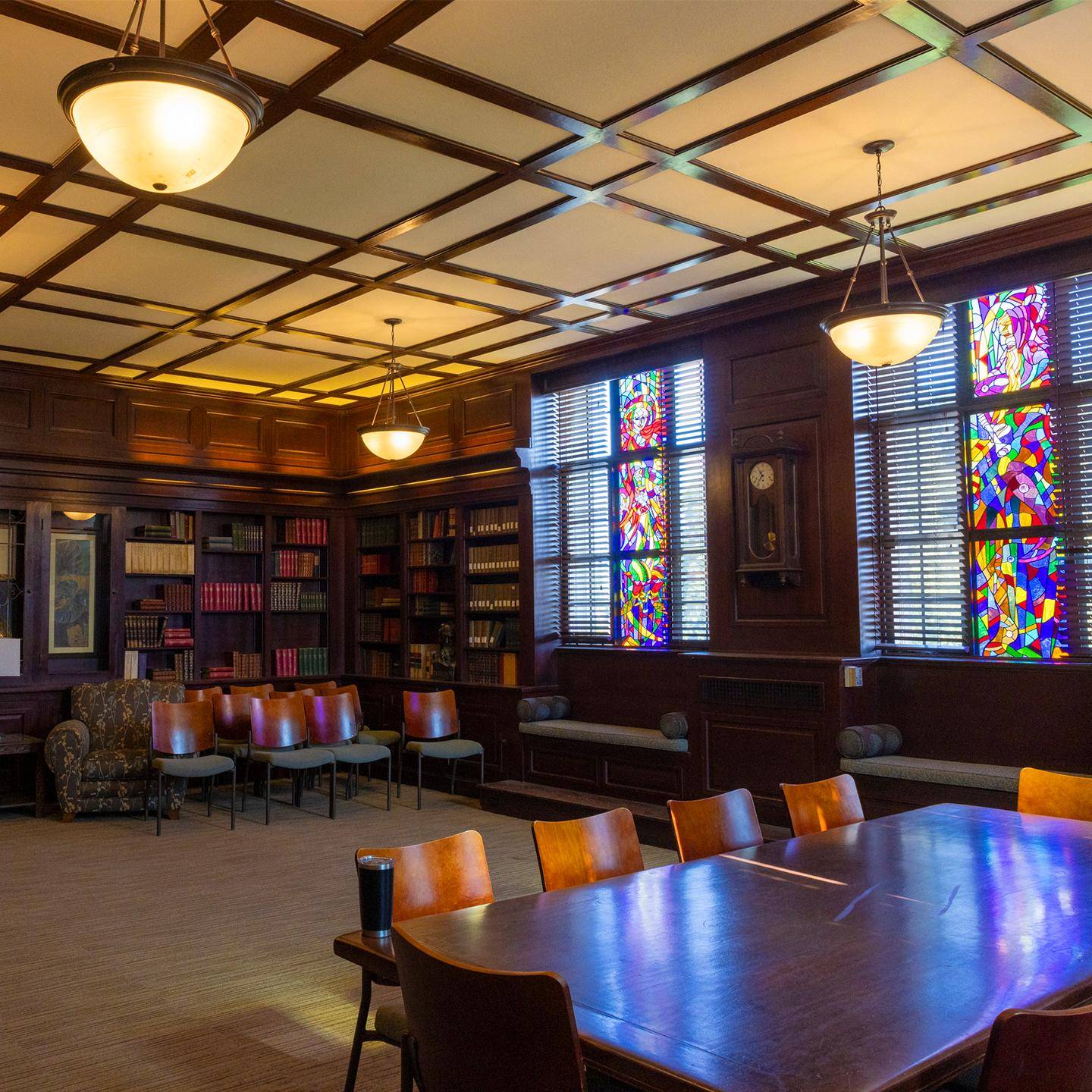 a room with a table and chairs