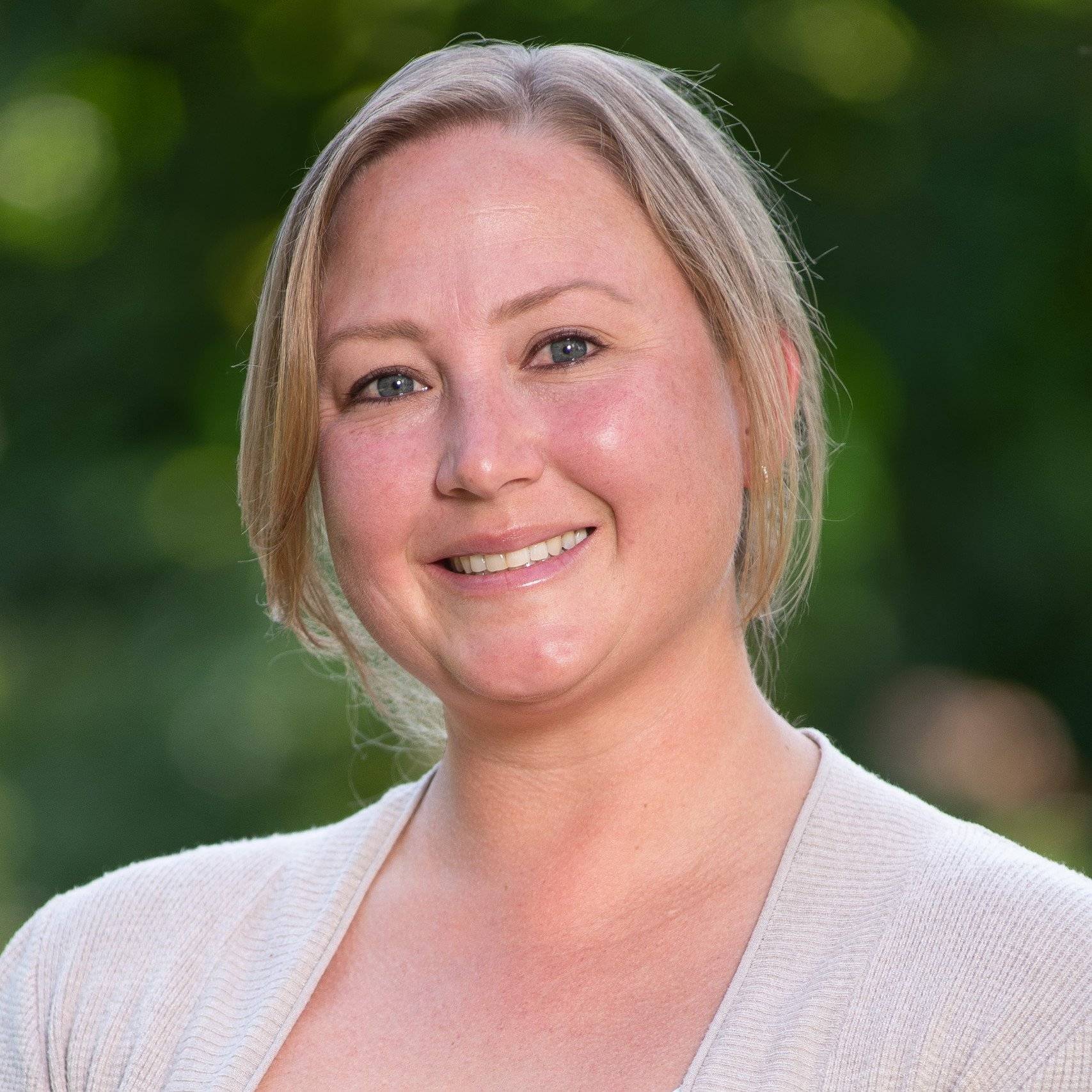 a person smiling for a picture