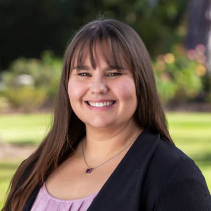 a person smiling at camera