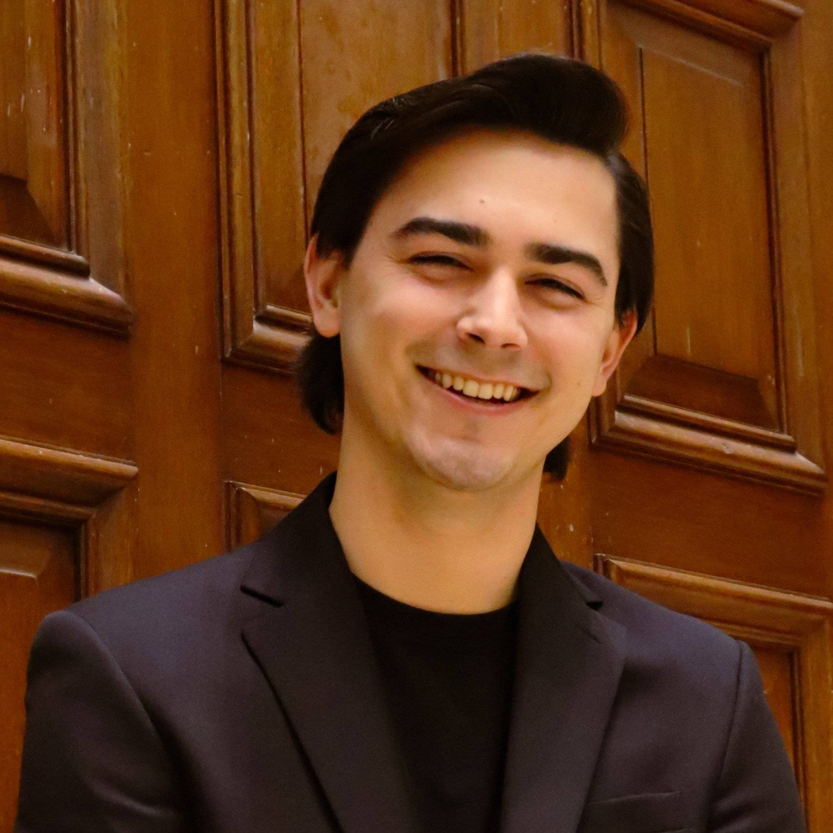 a person smiling at camera