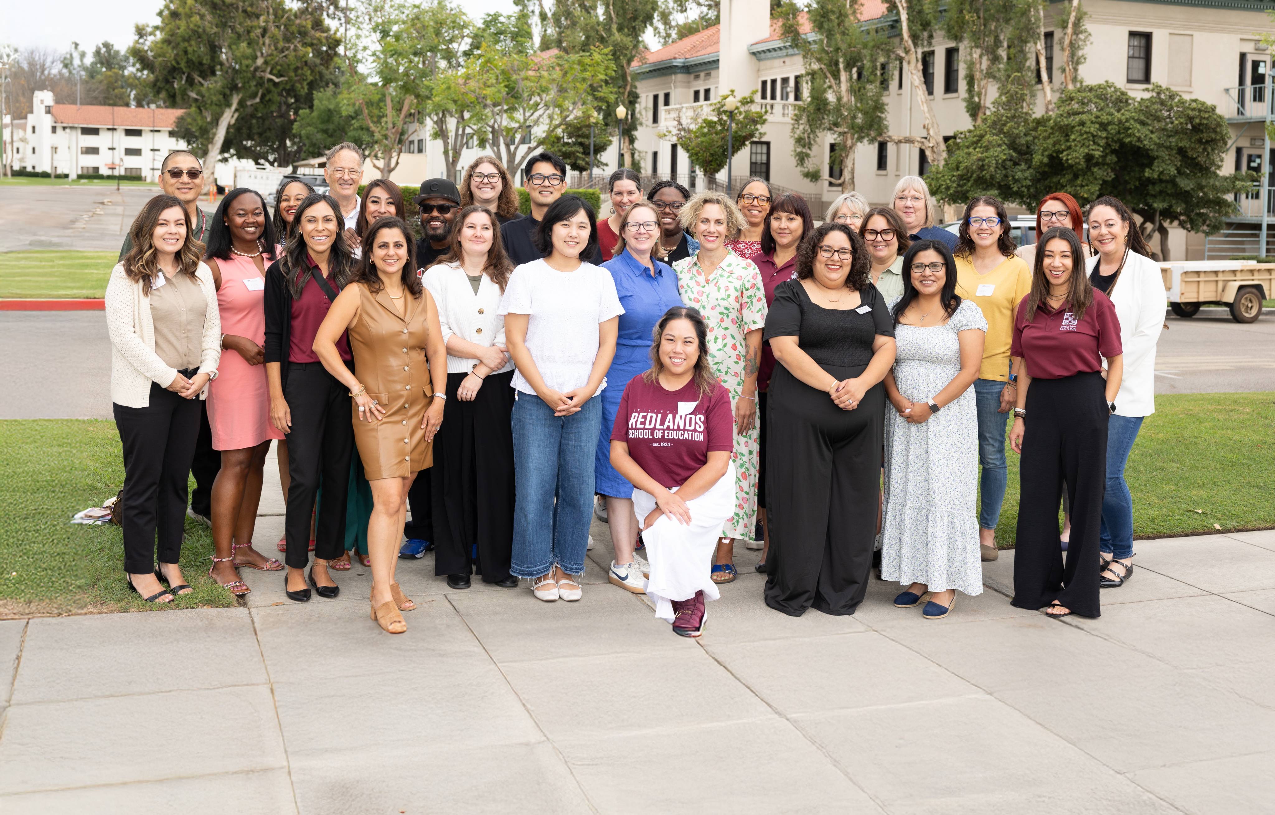 a group of people posing for a photo