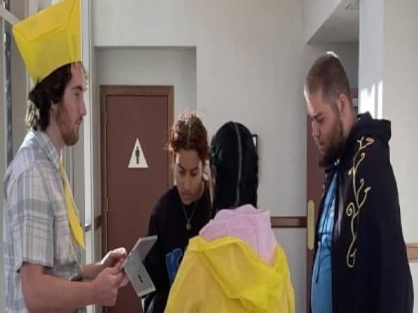 a group of people in a hallway