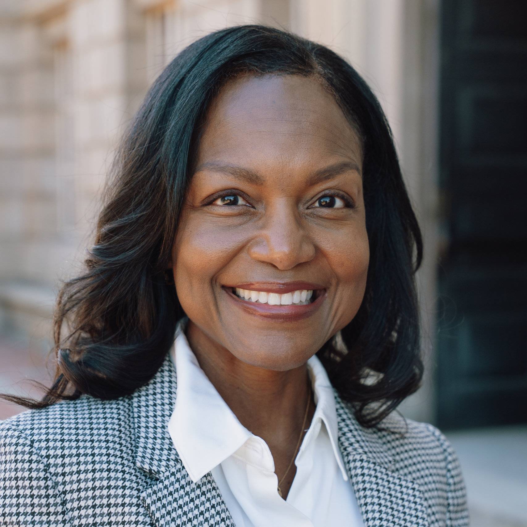 a person smiling at the camera