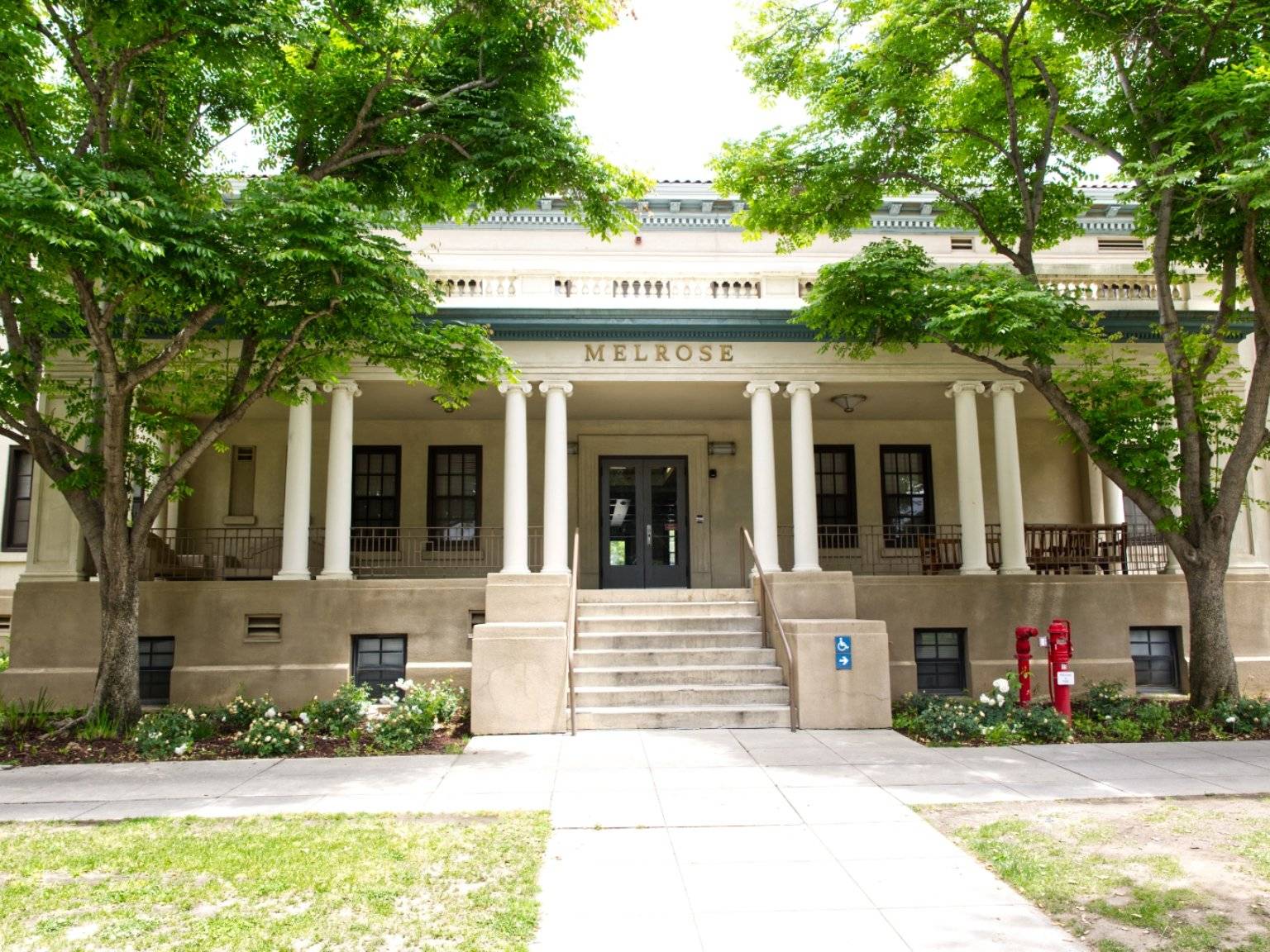 a building with columns and a walkway