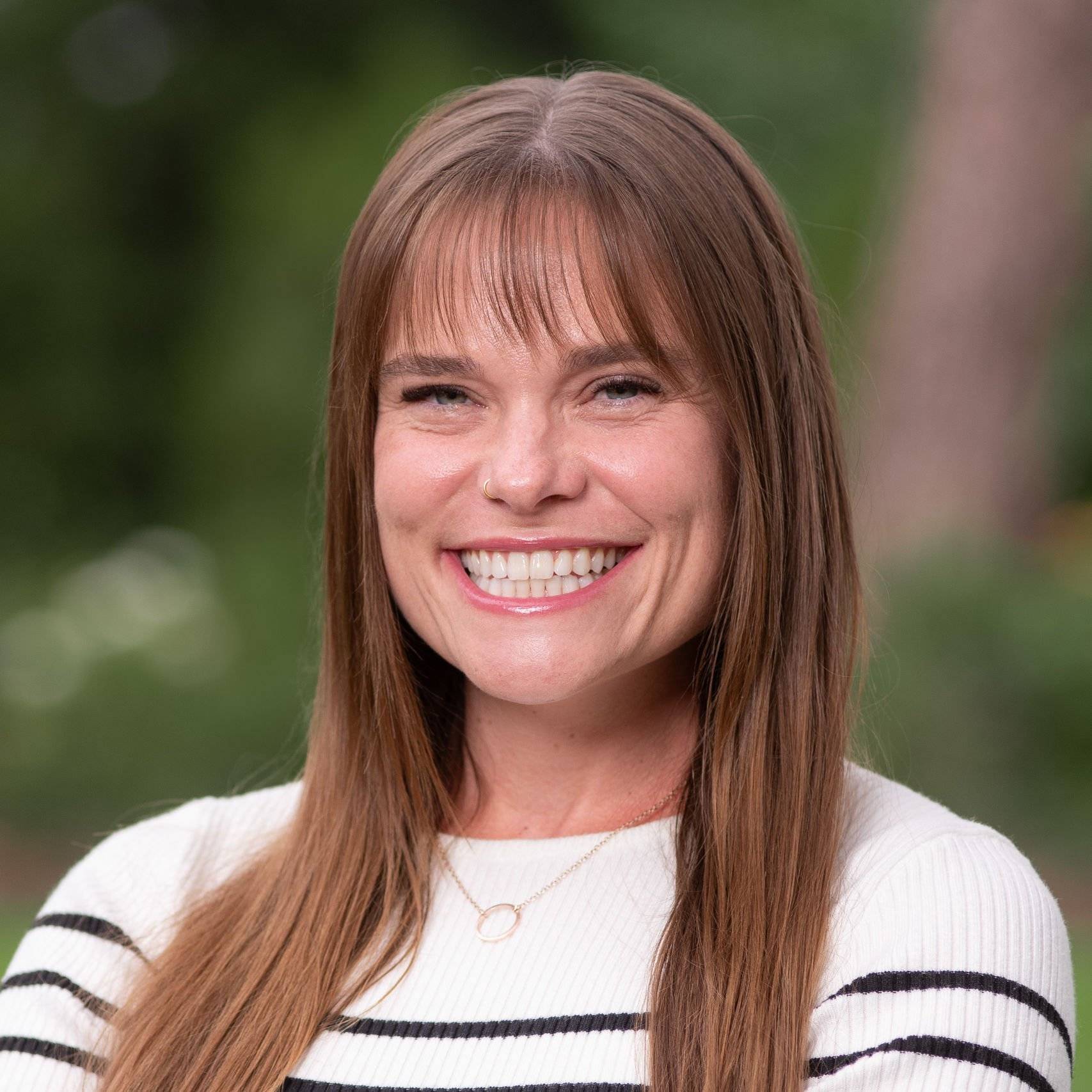 a person smiling at camera