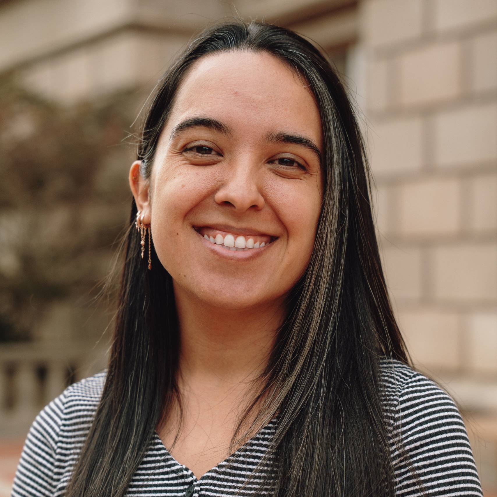 a person smiling at camera