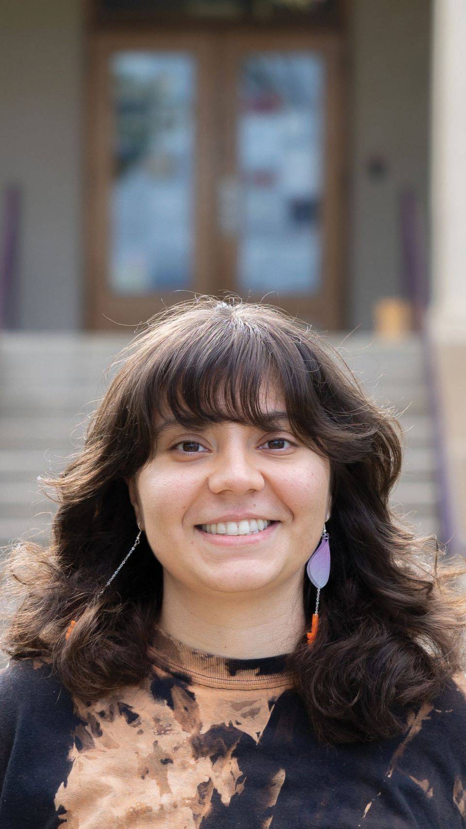 a person smiling at camera