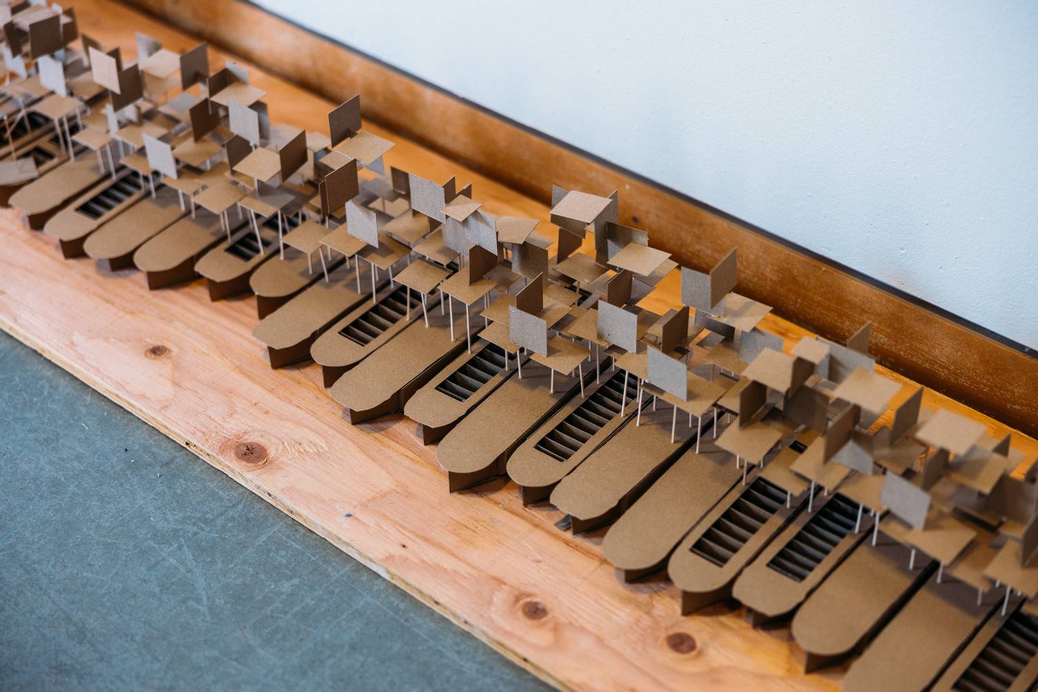 a group of cardboard model of a building