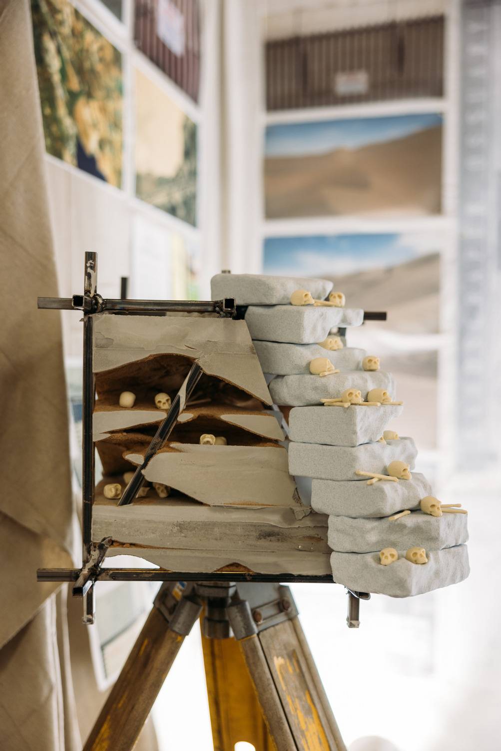 a model of a building with skulls on it