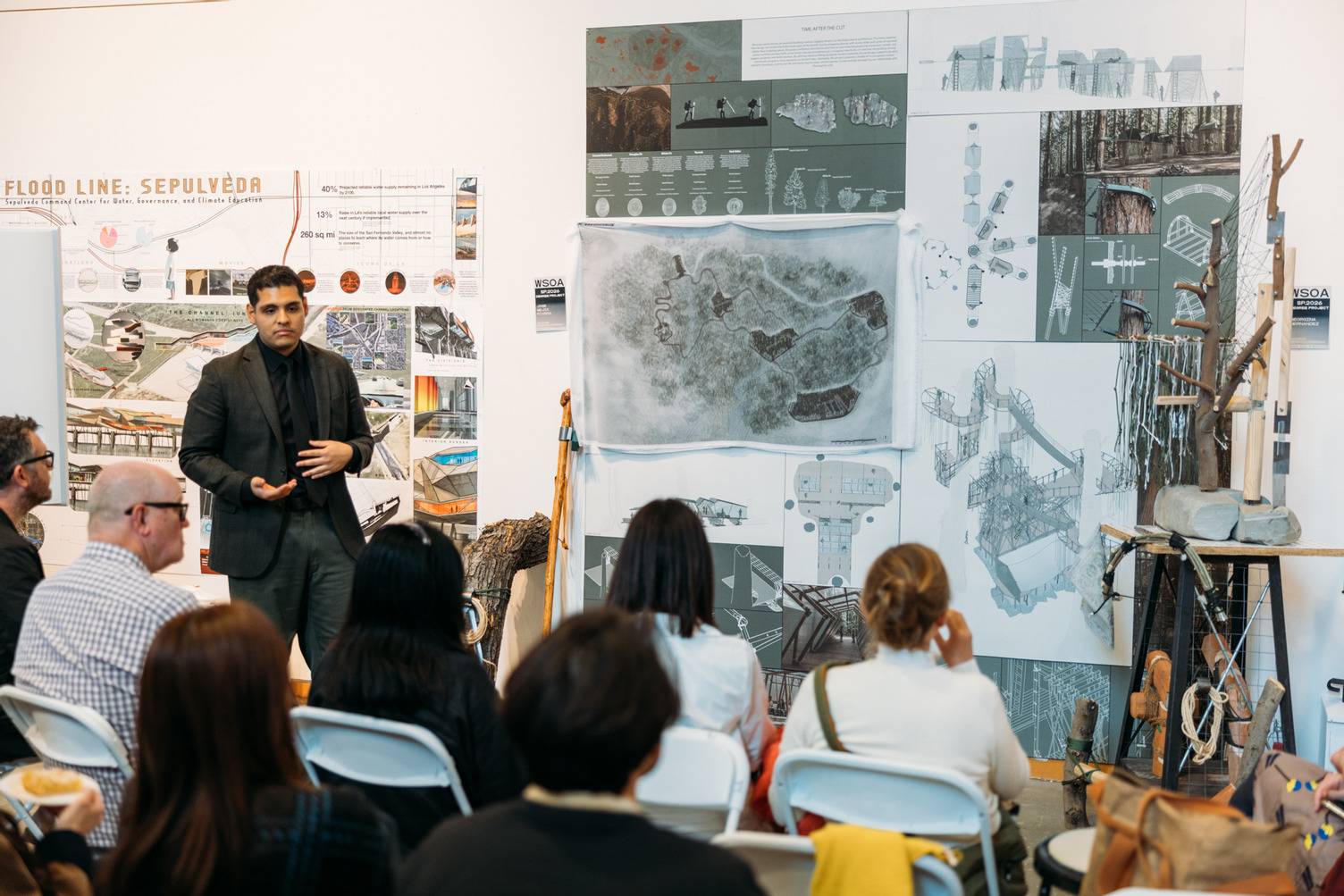 a person standing in front of a group of people