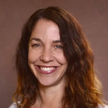 a person smiling at the camera