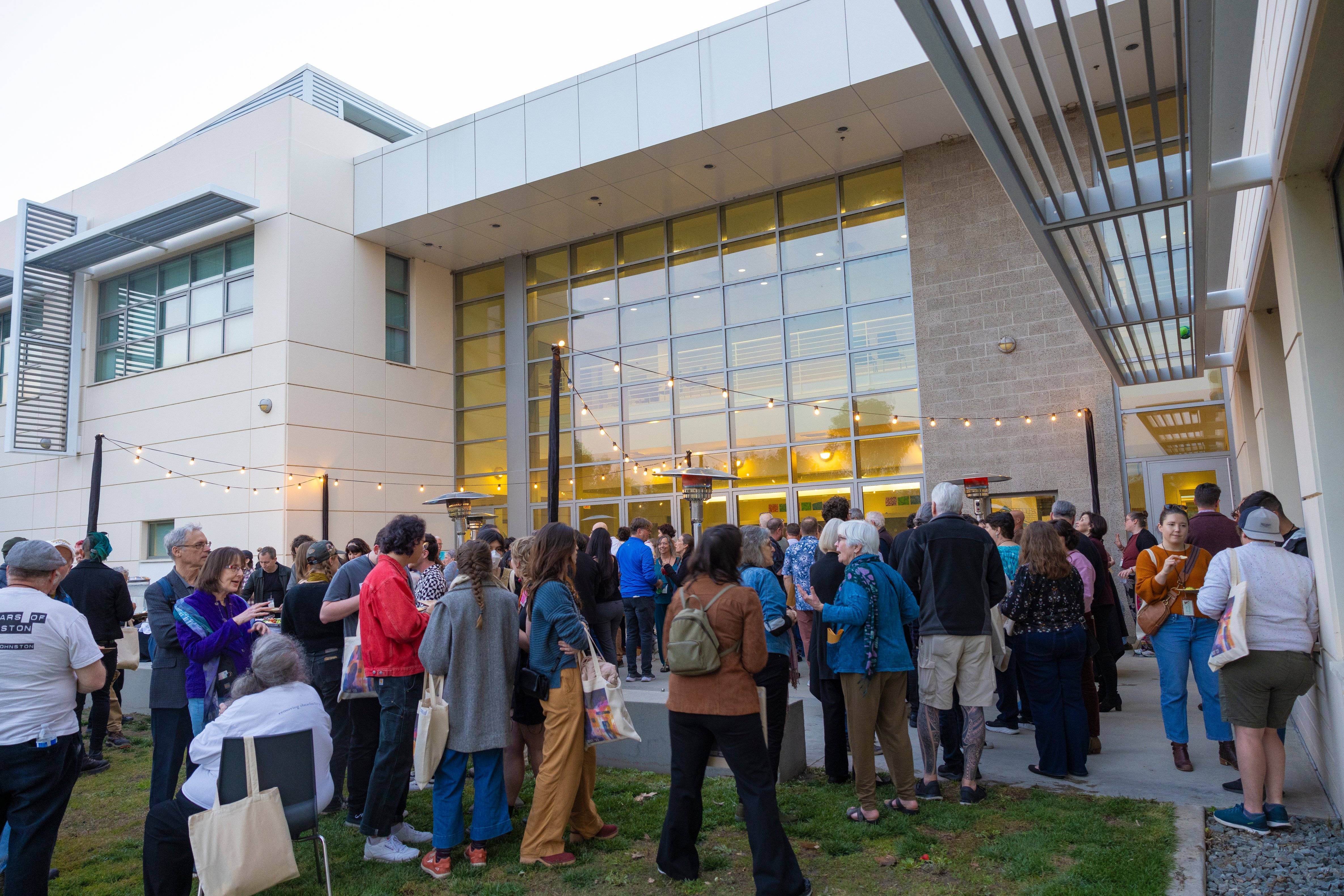 a group of people outside a building