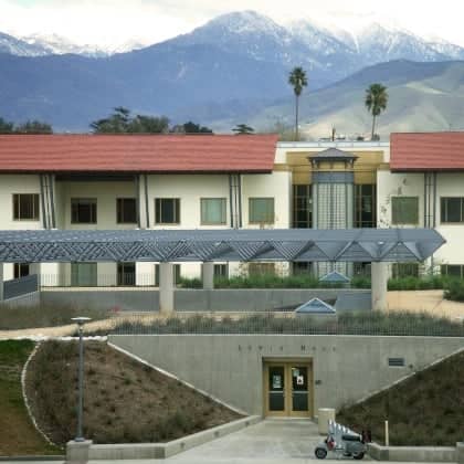 a building with a mountain in the background