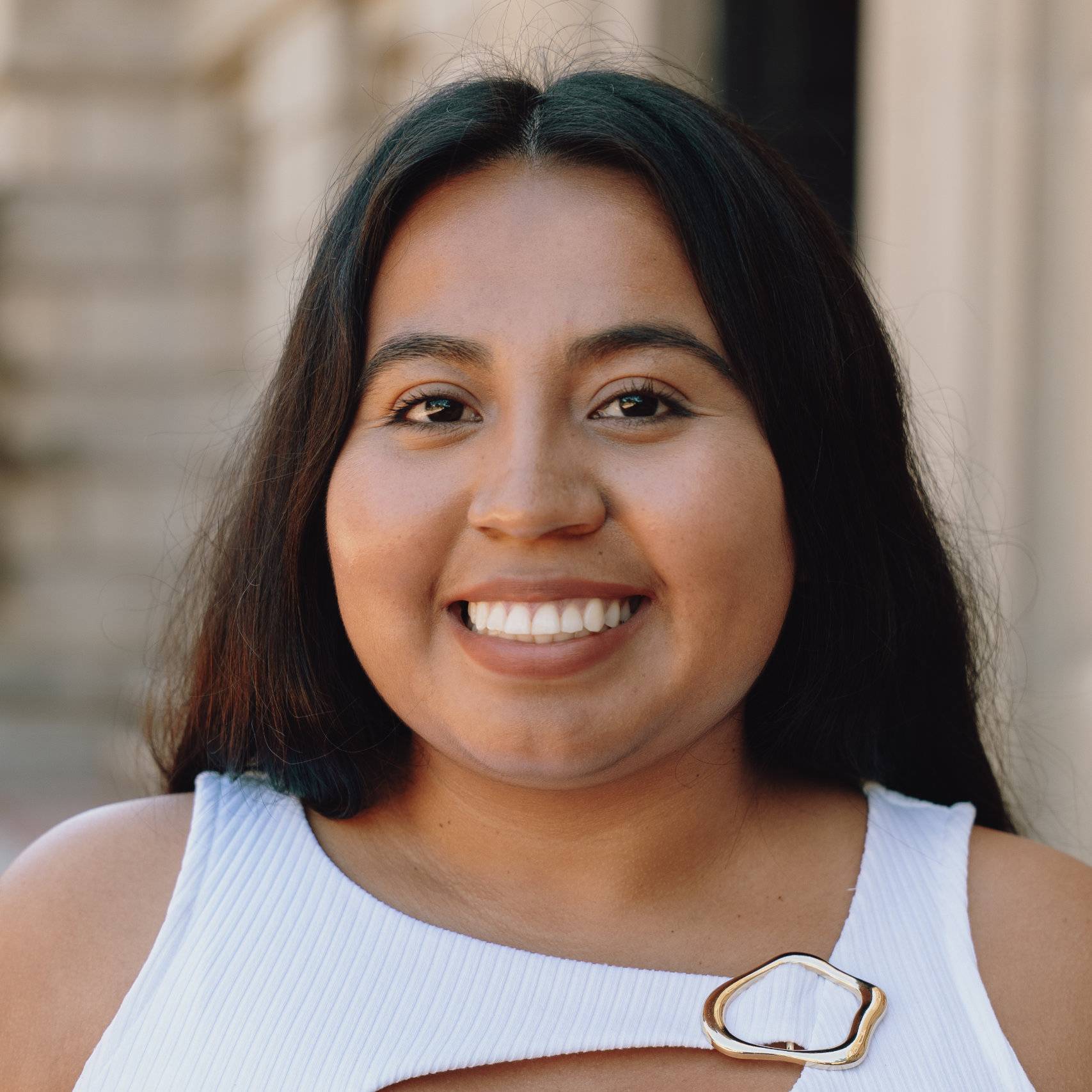a person smiling at camera
