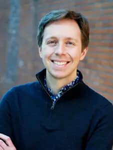 a person smiling at the camera