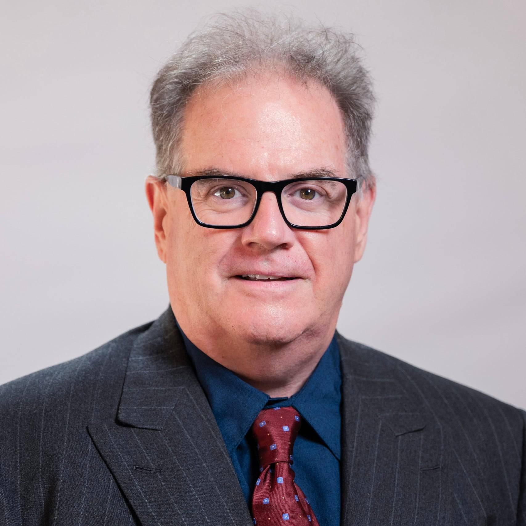 a person in a suit and tie
