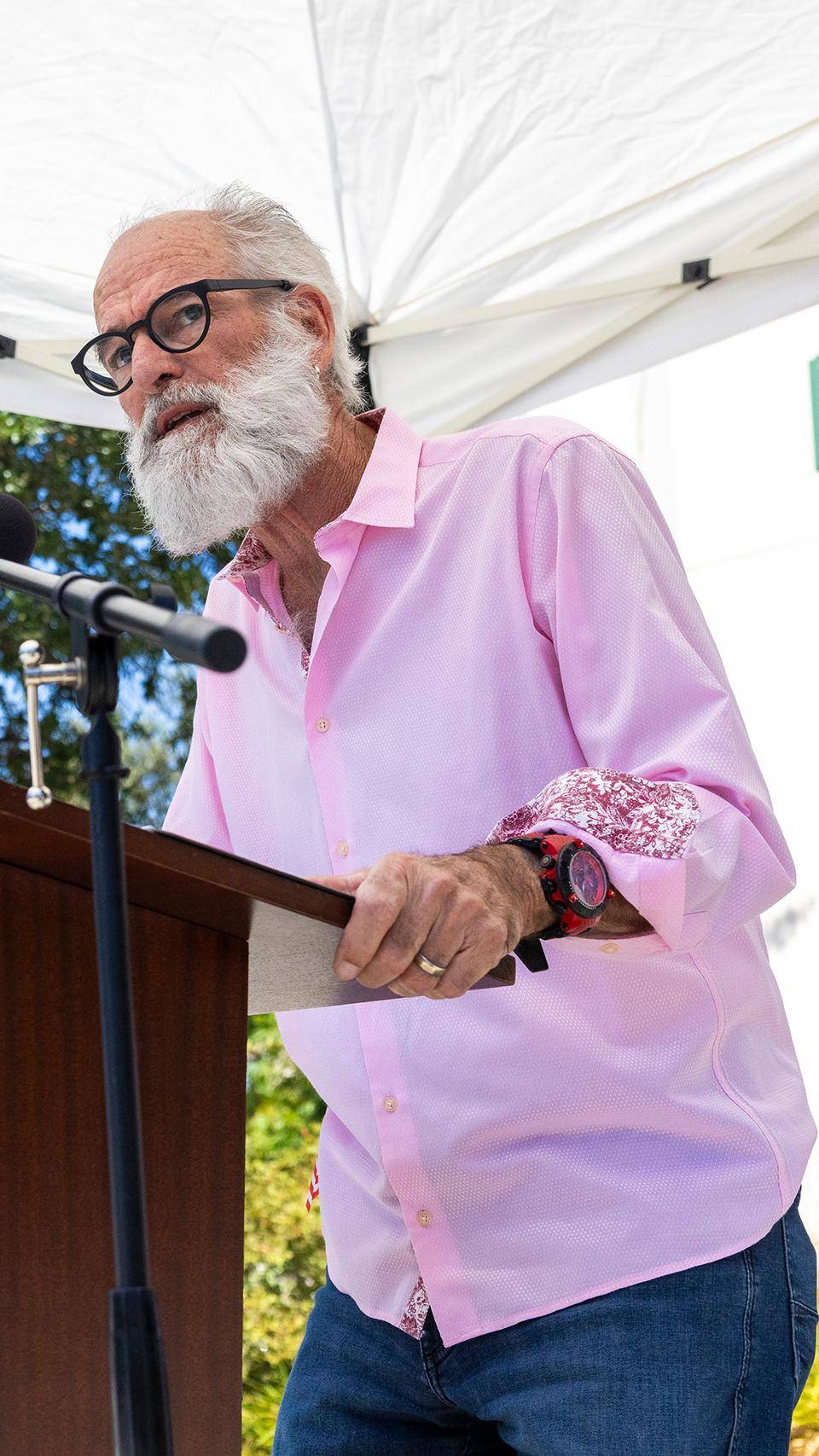 a person standing at a podium