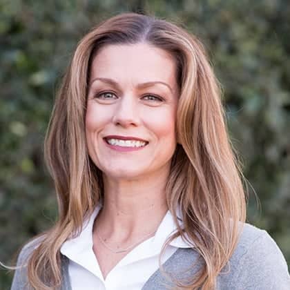 a person smiling at the camera