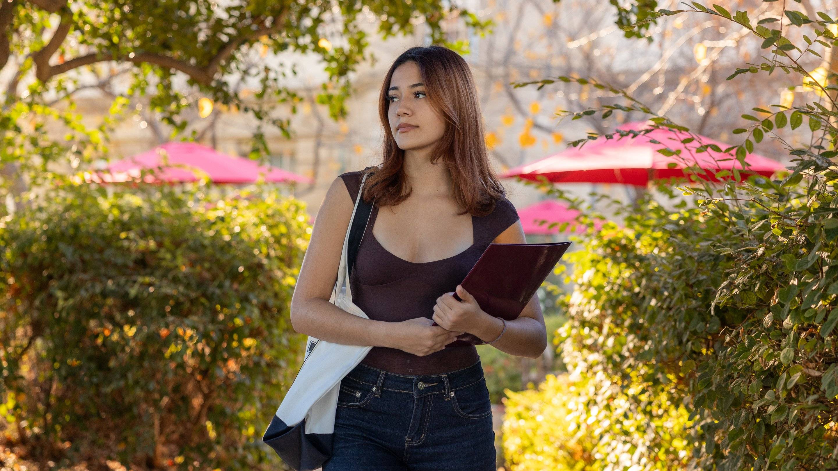 a person holding a folder