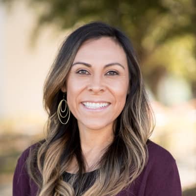 a person smiling at camera