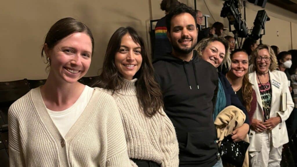 a group of people posing for a photo