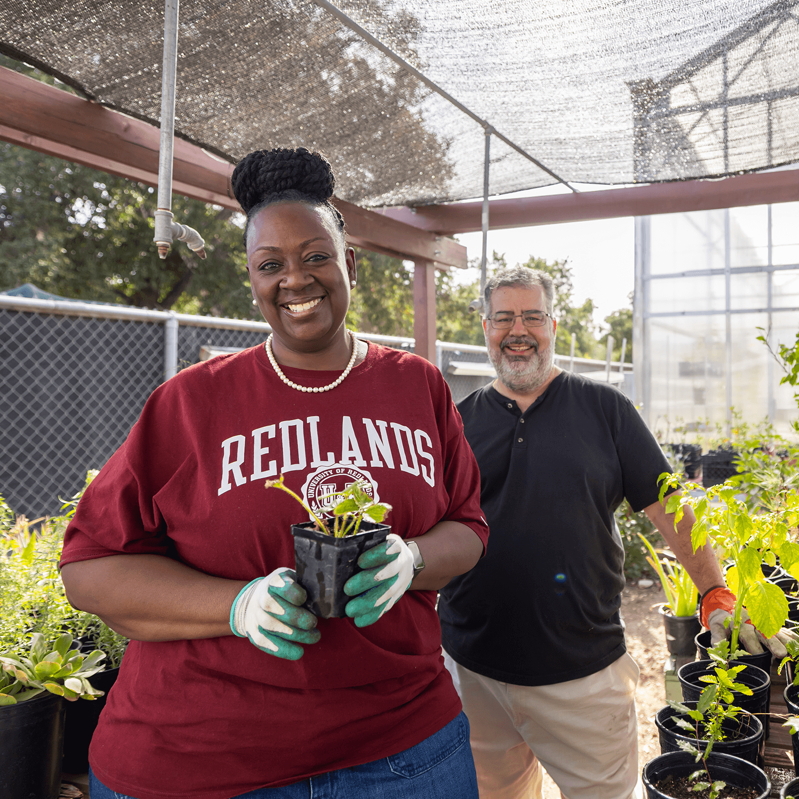 a person and person holding a plant