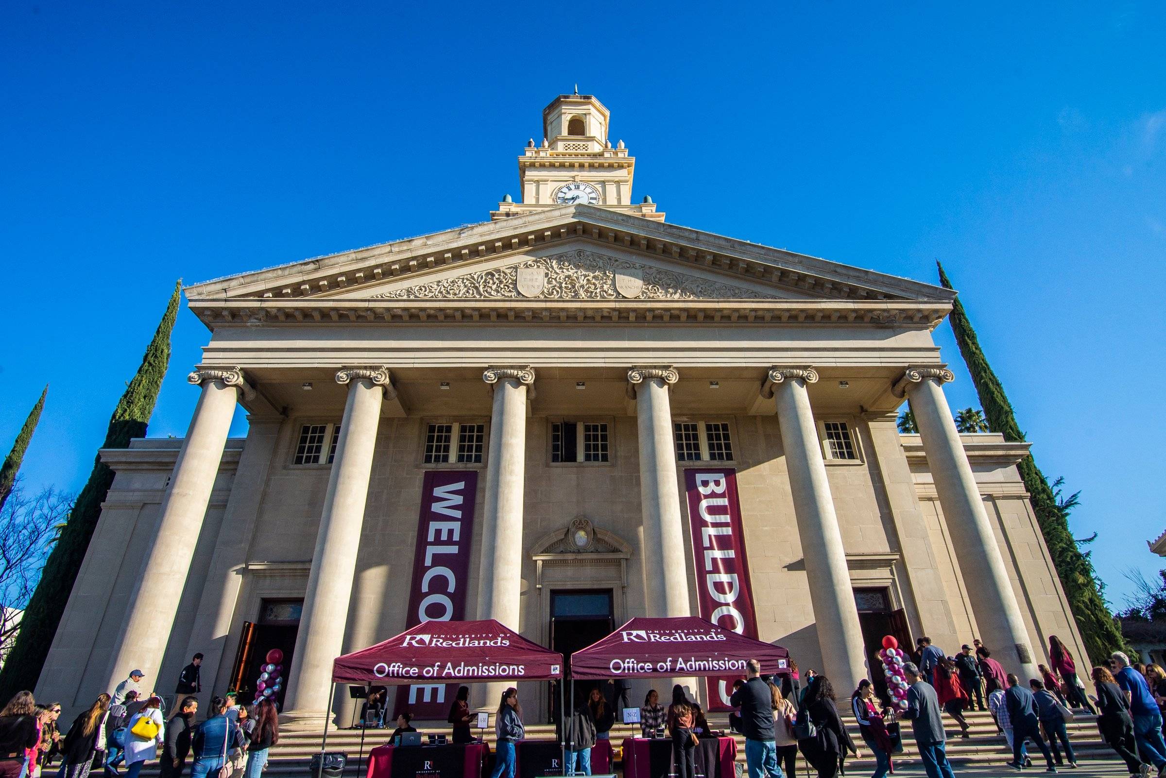 a group of people outside of a building