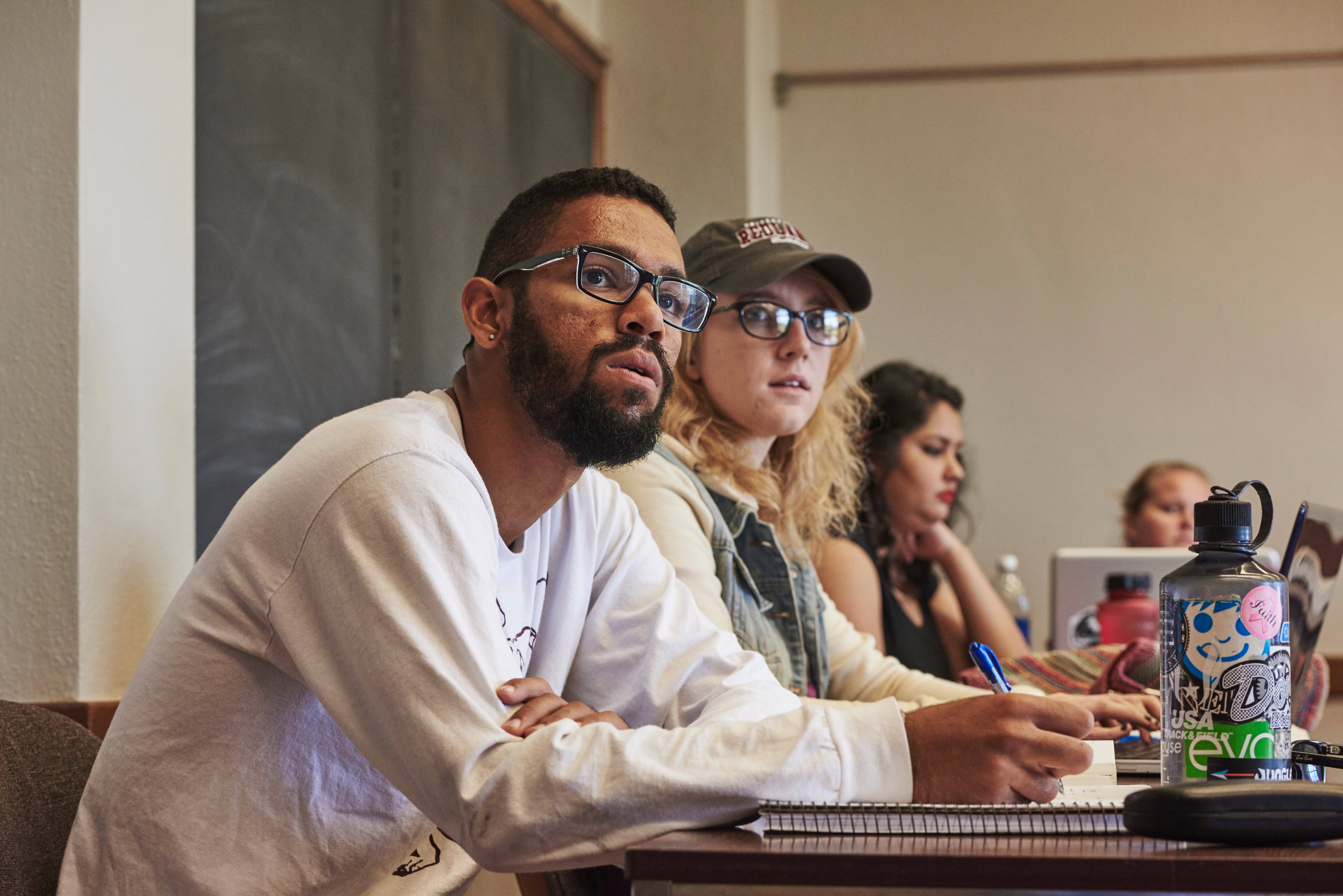 a group of people sitting at a table