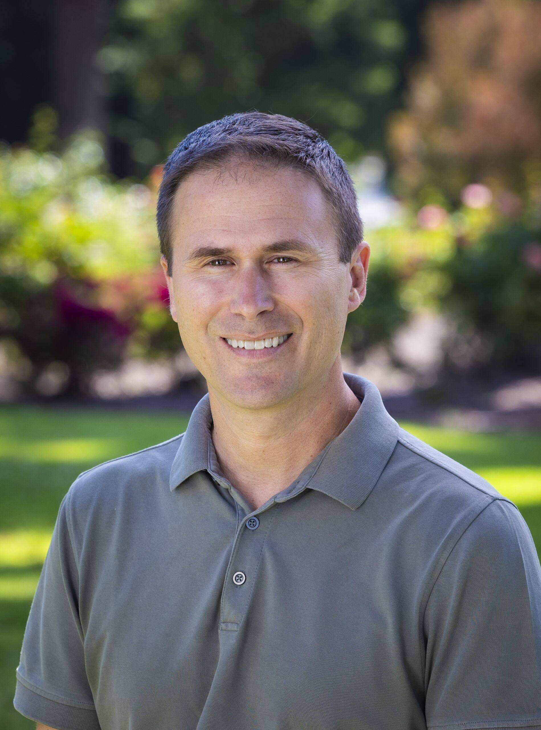 a person smiling at the camera