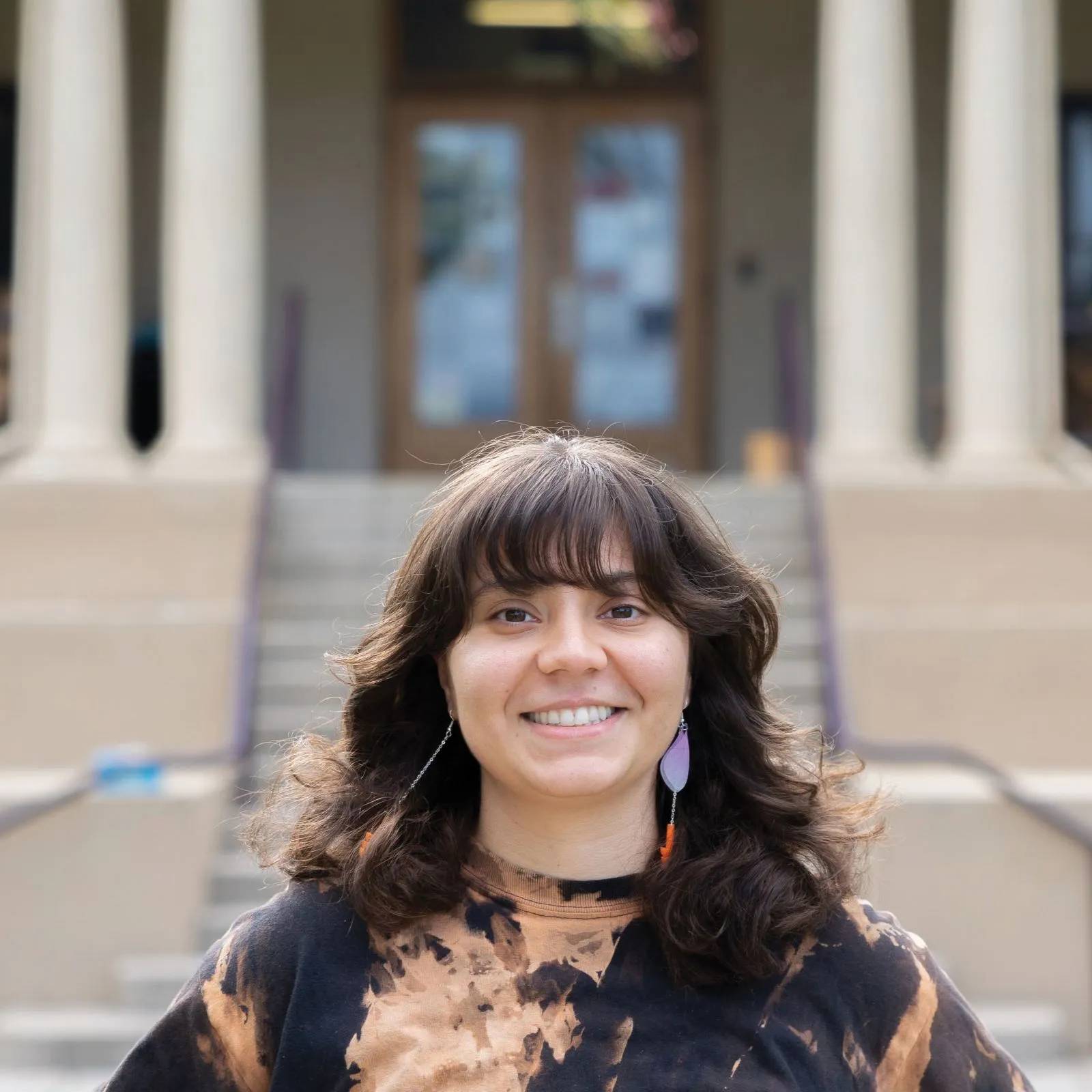 a person smiling at camera