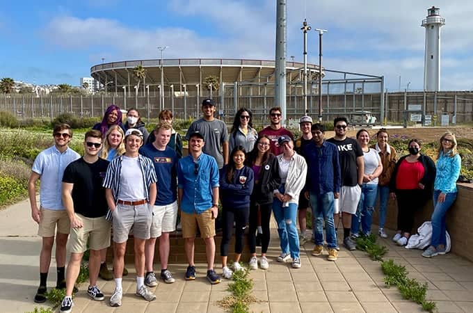 a group of people posing for a photo