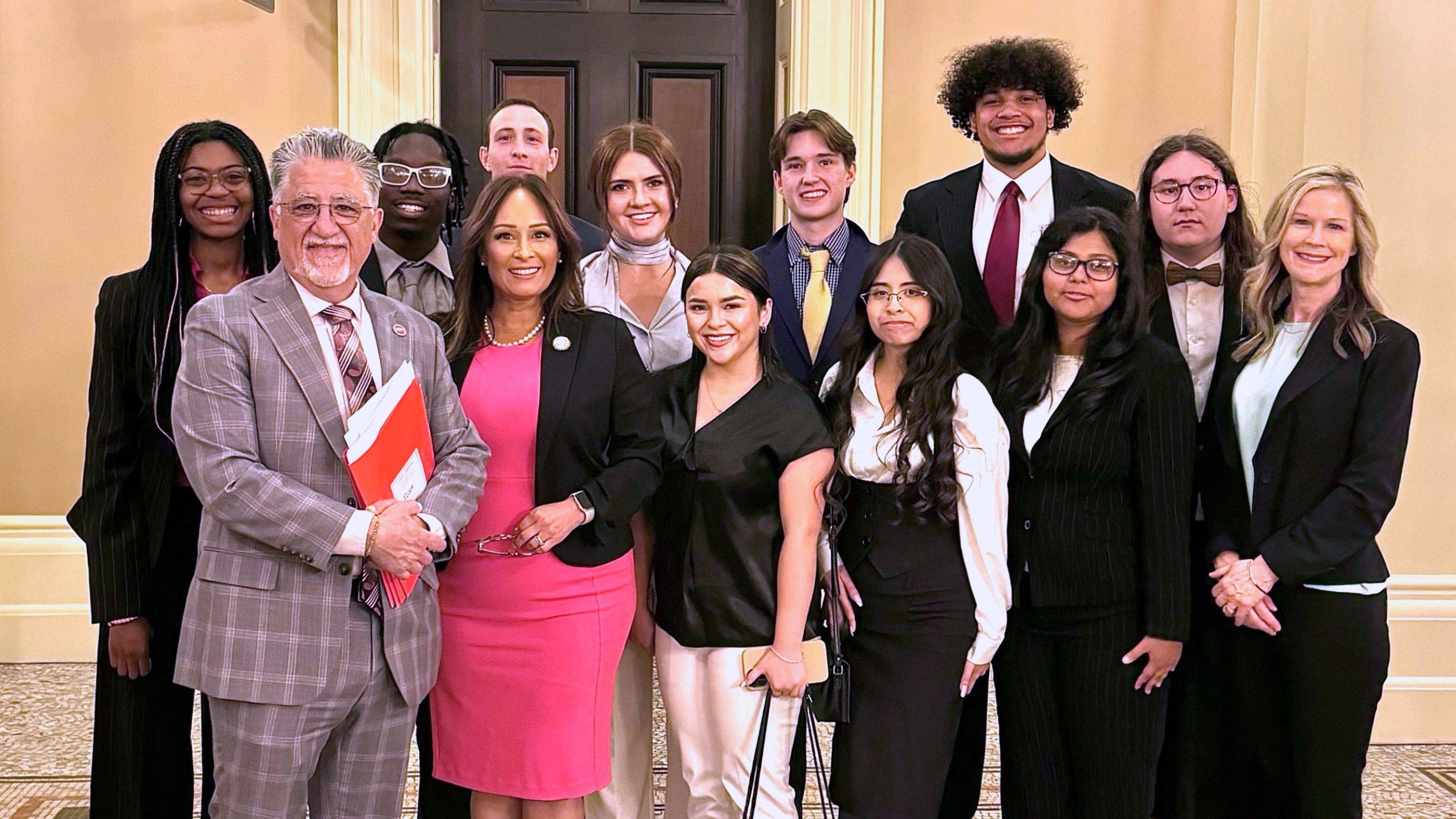 a group of people posing for a photo