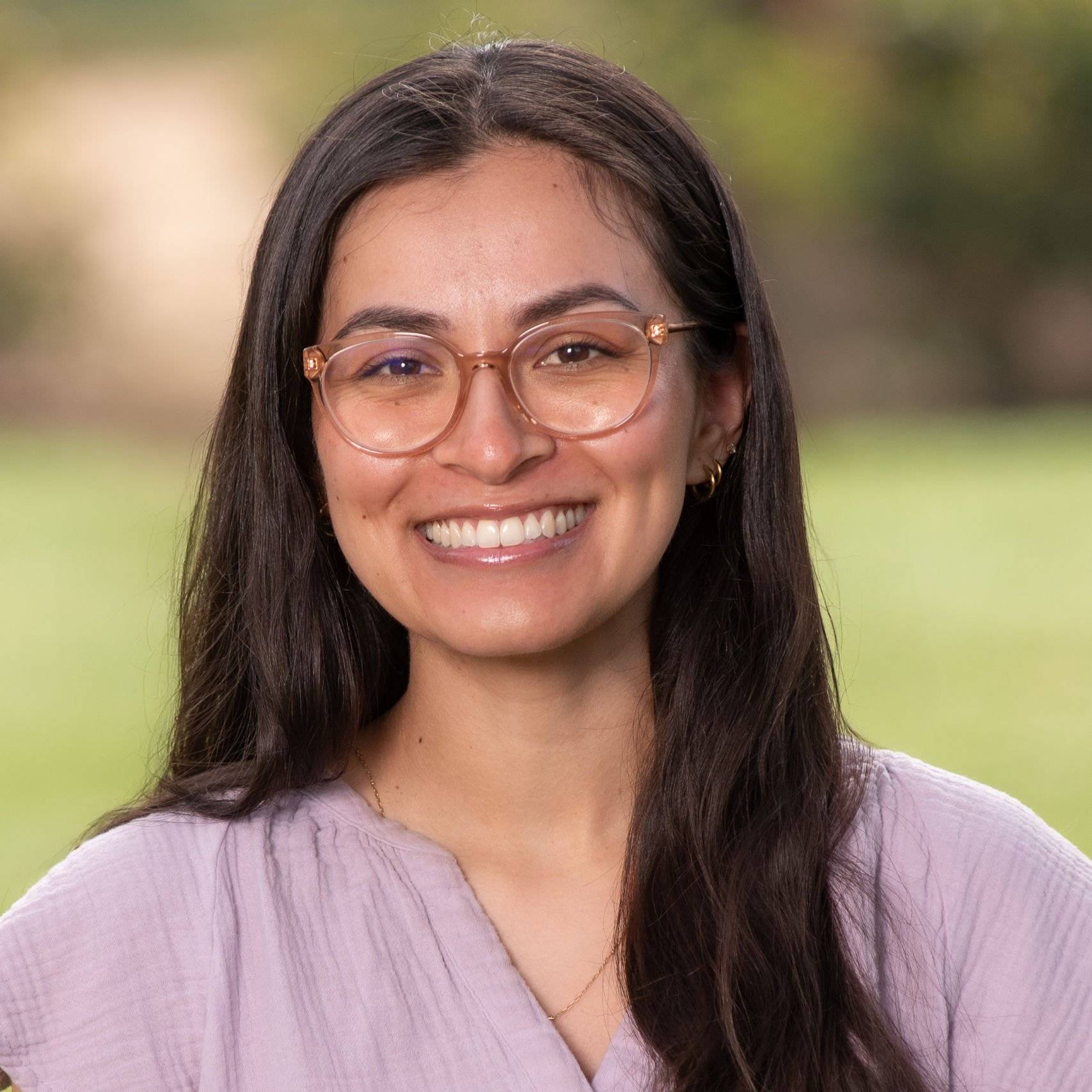a person smiling at camera