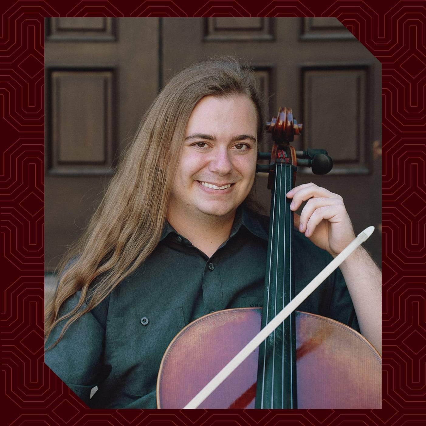 a person holding a cello