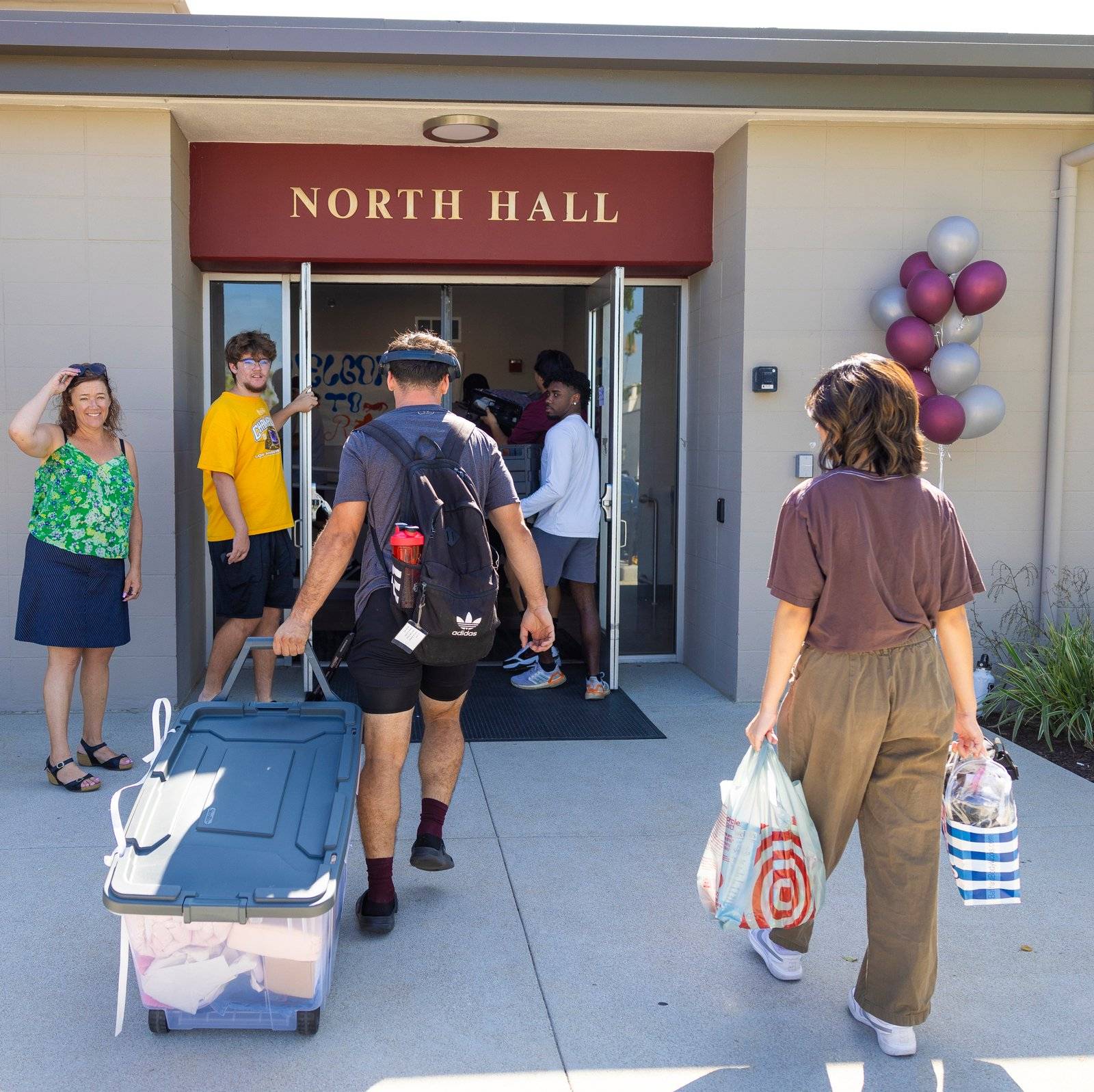 a group of people outside a building