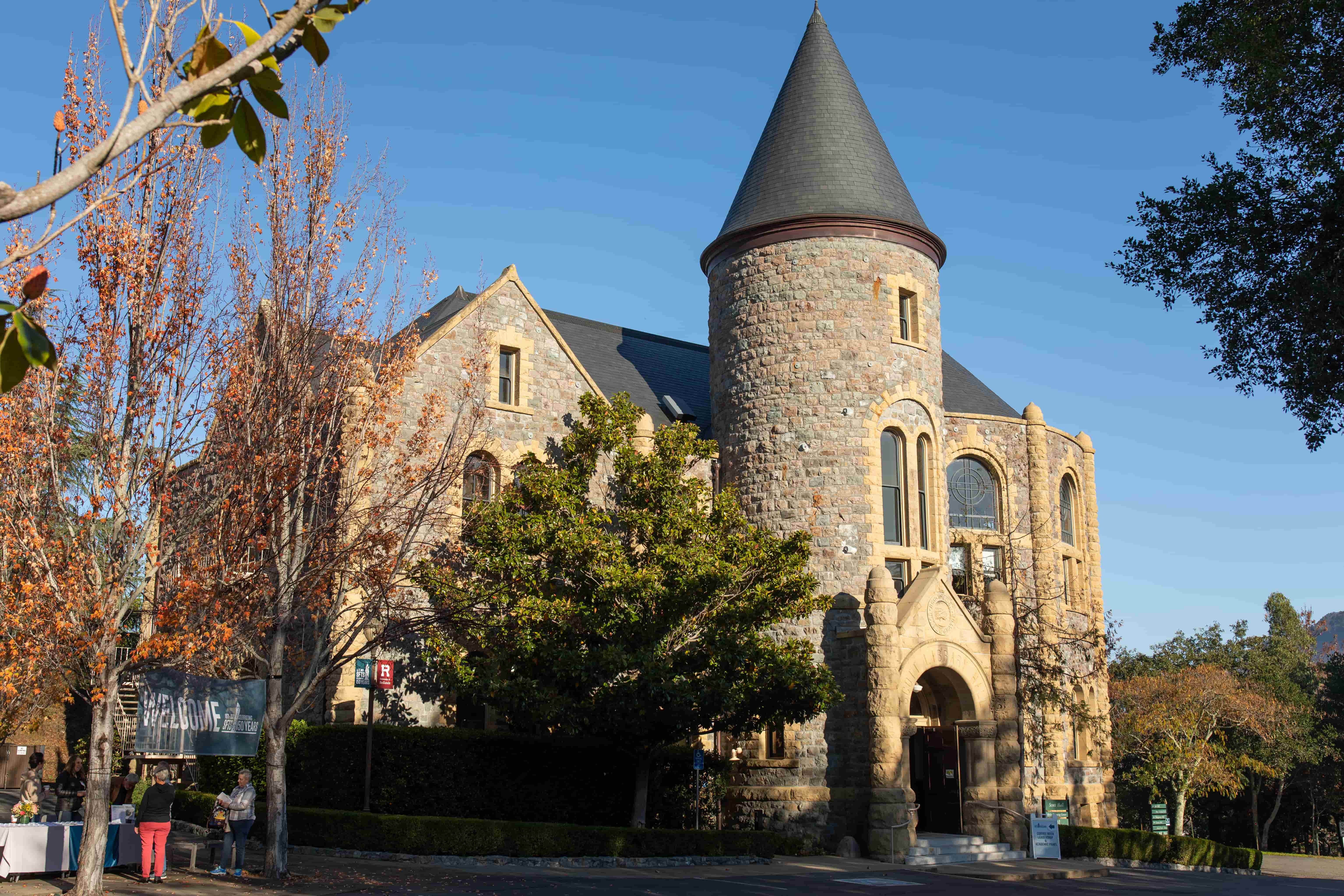 a stone building with a pointed roof