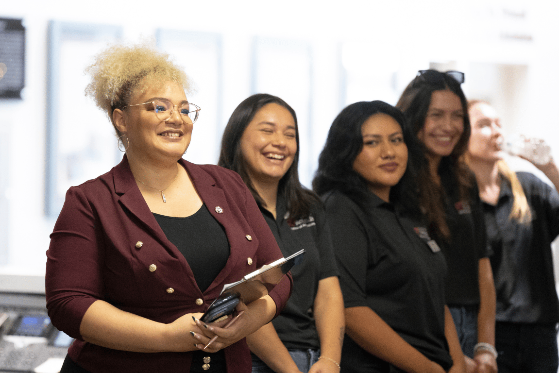 a group of women smiling