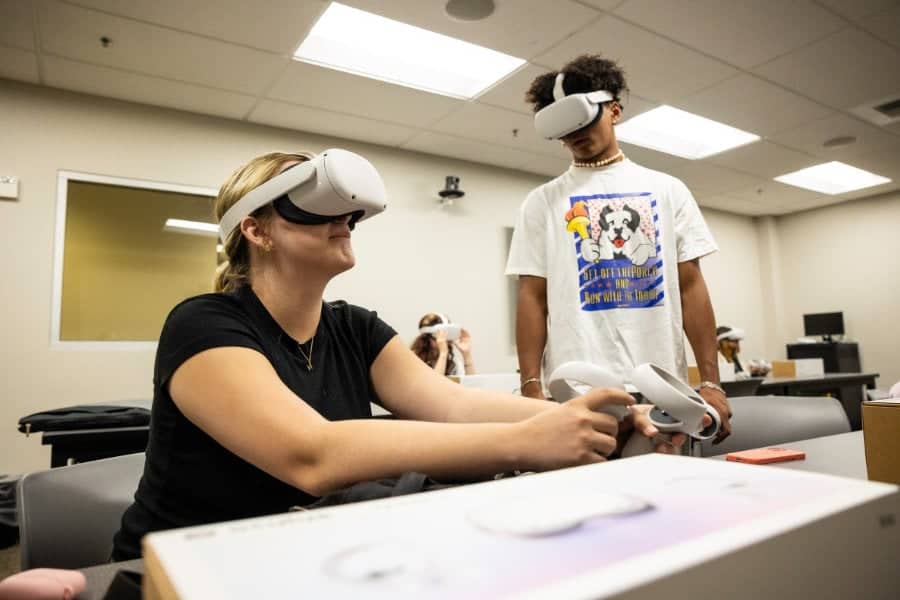a person wearing virtual reality goggles